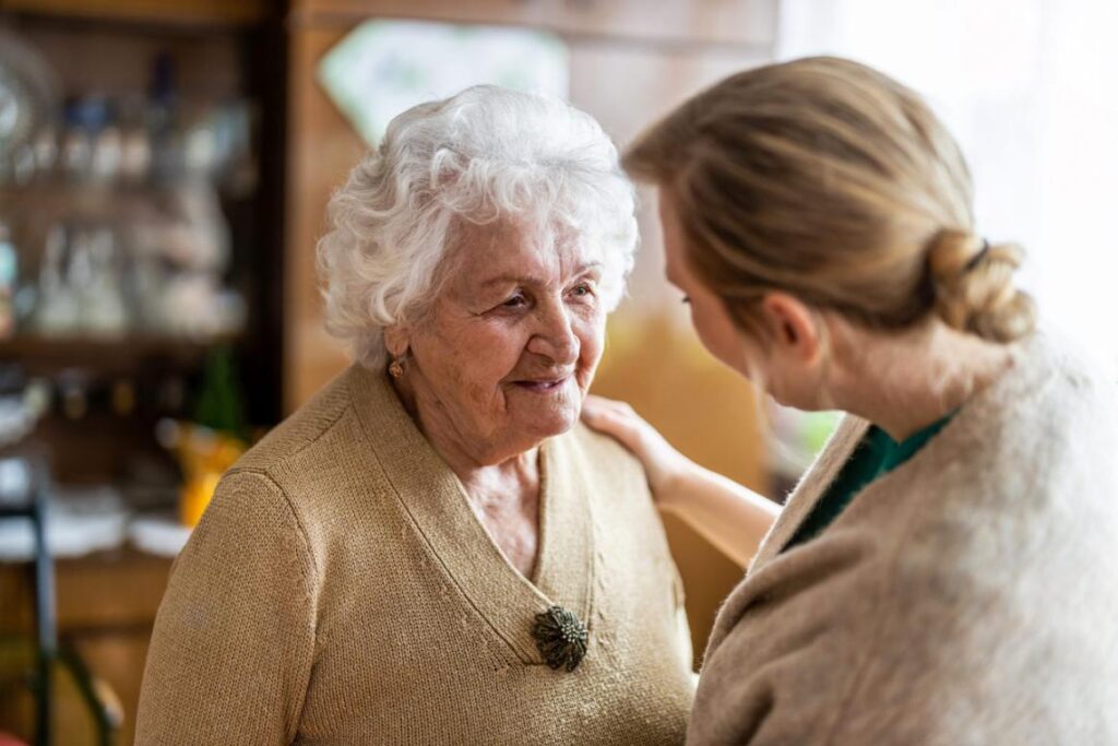 Resident embracing a loved one
