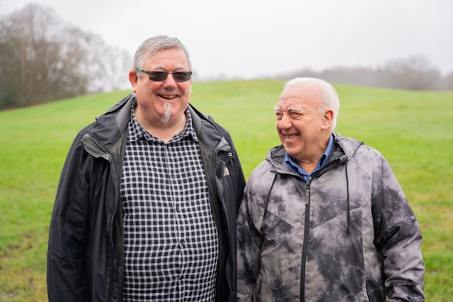 two men outside in countryside