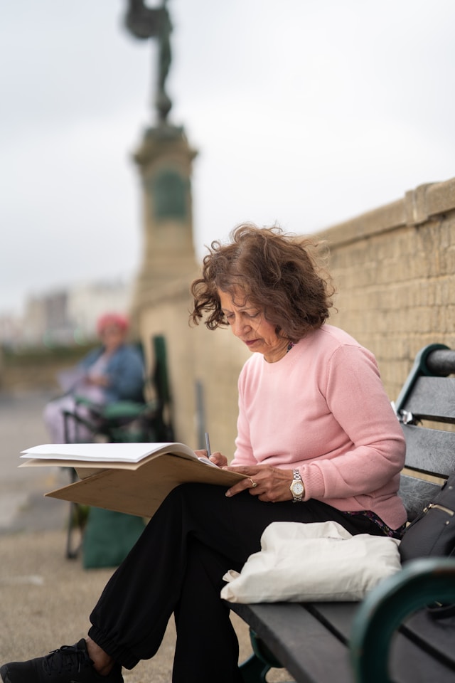 Lady drawing outside